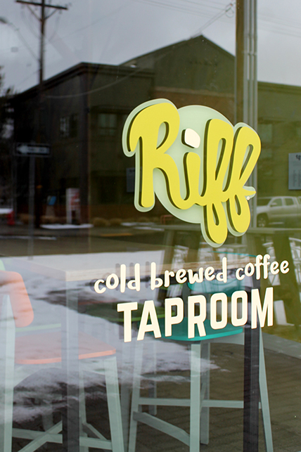 A close up of the Riff logo on their glass garage door windows
